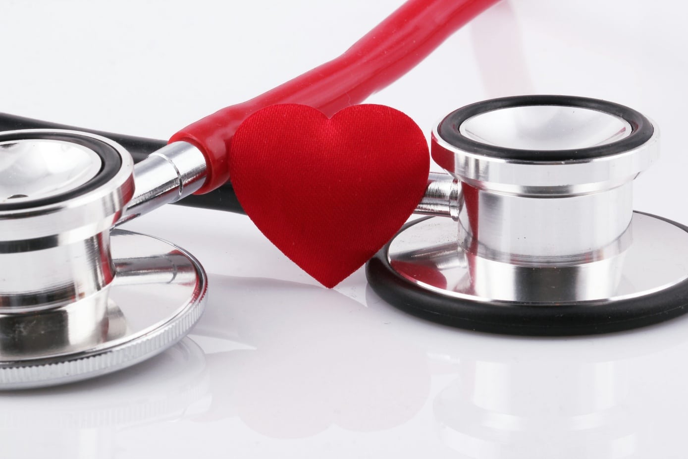 Stethoscope with red heart symbol representing heart health and hypertension awareness
