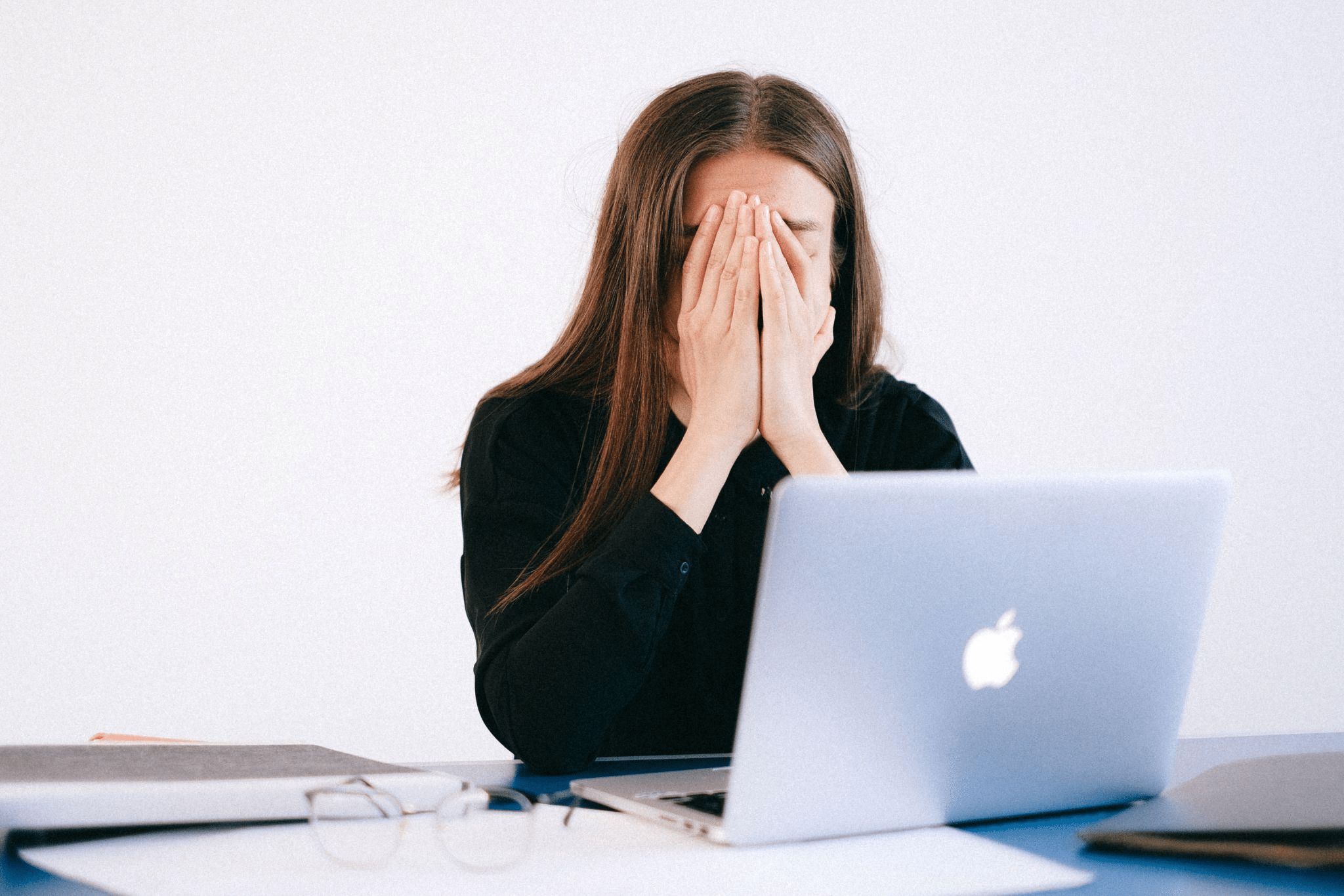 a woman feeling unwell at work