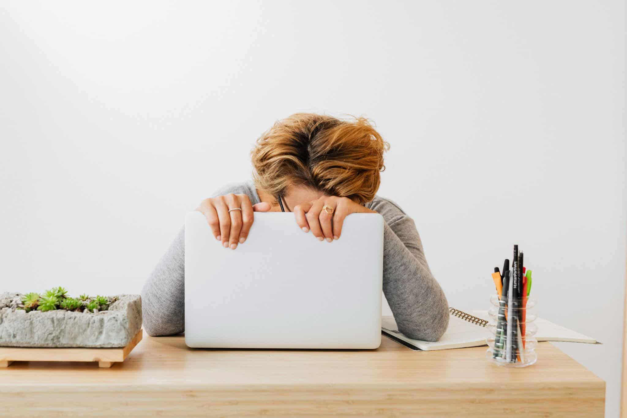 A person feeling unwell while working