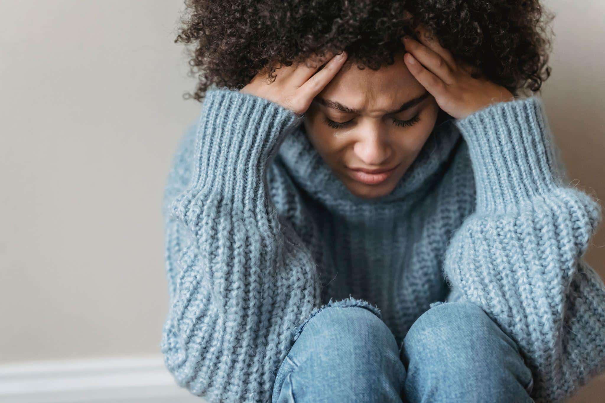 a person dealing with a migraine