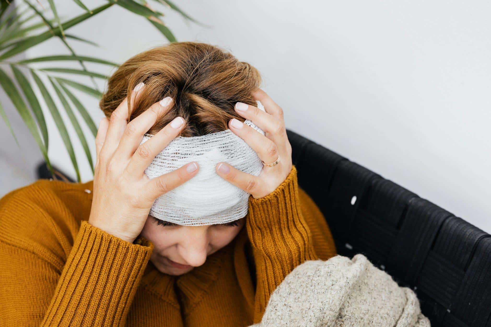 a person suffering from a terrible headache
