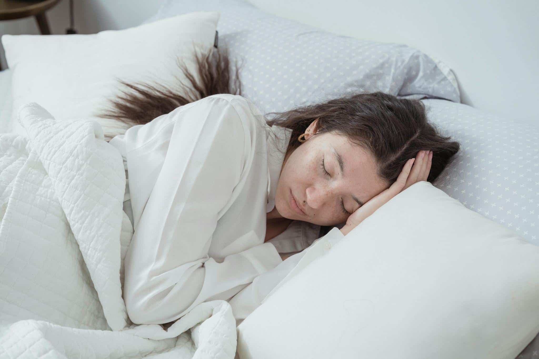 a pregnant woman resting in bed